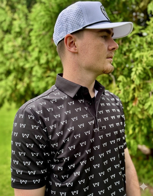 Man wearing black OG logo polo golf shirt with white Poker logo hat